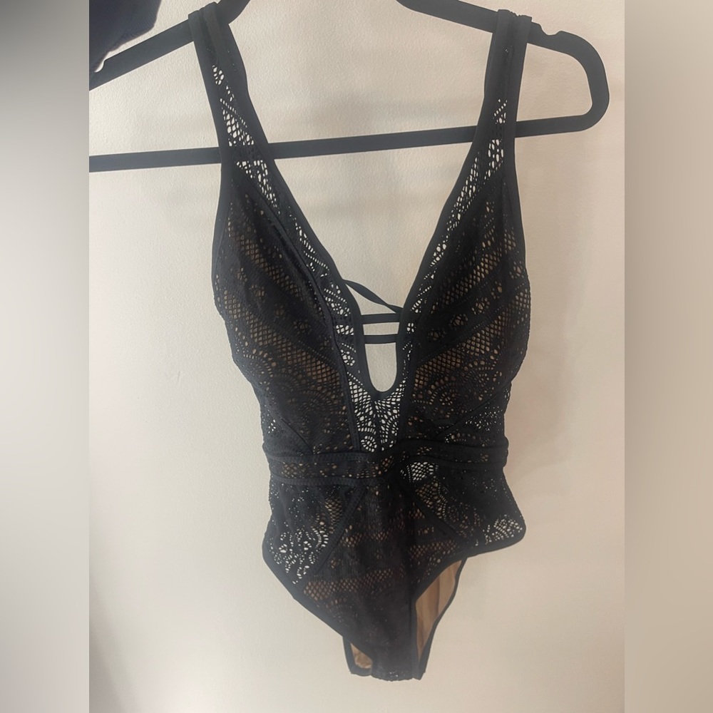 Becca Swim black lace one piece swimsuit. Never worn! Super flattering and sexy
